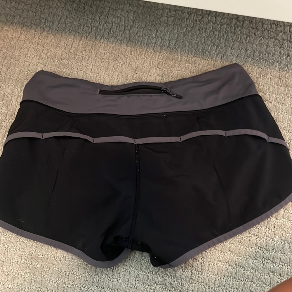 Size 4. Lululemon athletic shorts. Great condition and good colors.